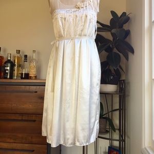 Cream white satin midi dress with ruffle flowers